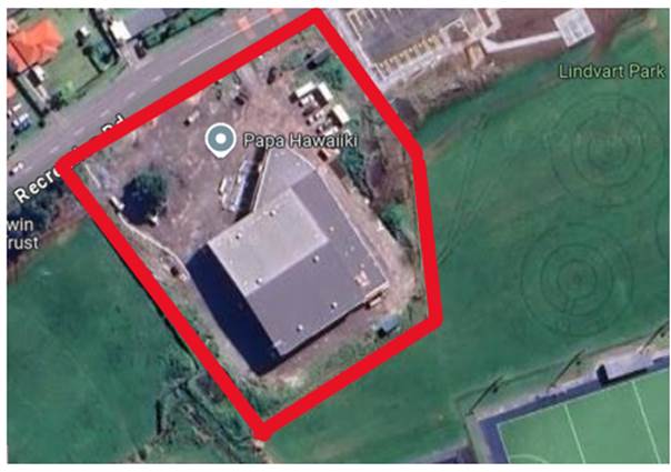 A aerial view of a building

Description automatically generated