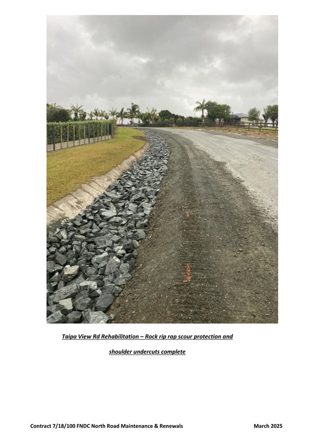 A road with rocks and grass

AI-generated content may be incorrect.