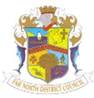 A colorful shield with a crown and text  Description automatically generated